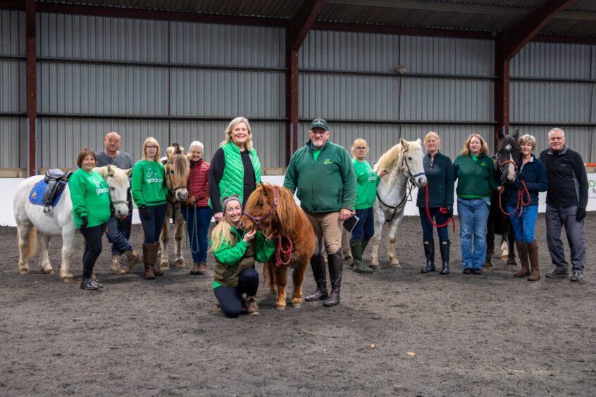 Debs Mackay, Fiona Pearson and Ian Duncan with Jemma the Shetland Pony and volunteers at the Gordon Riding for the Disabled Association and Inverurie Therapy Pony Centre. riding centre. Image Kath Flannery/DC Thomson