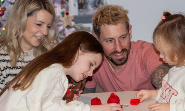 Carla Lawrence with Luna, Jo and youngest daughter Blu today. The couple fought Jo's post-natal depression together. Image: Kami Thomson/DC Thomson