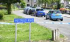 Westfield Road, Inverurie sign, with police tape.