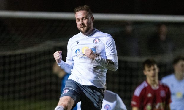 Danny Handling celebrates after his goal made it 2-0 for Brechin City at Lossiemouth. Images: Jasperimage
