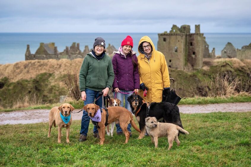Marion Montgomery with Paws on Plastic members and supporters near Dunnottar Castle 