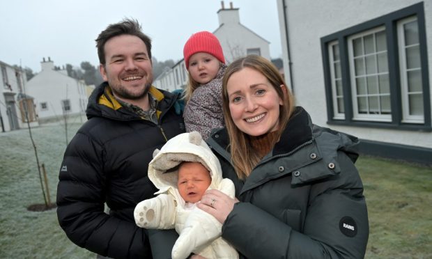 John and Hannah Mackay with  daughter Mathilda, 2,  and new son Hugo. Imager Sandy McCook/DC Thomson