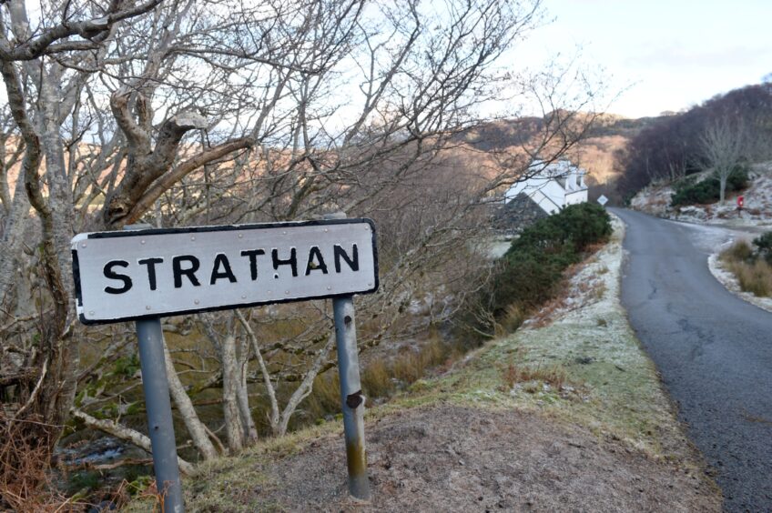 The sign for Strathan on the shores of Strathan Bay.