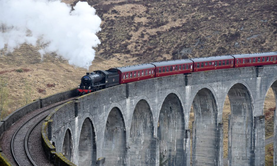 Harry Potter Jacobite steam train on the Glenfinnan Viaduct.