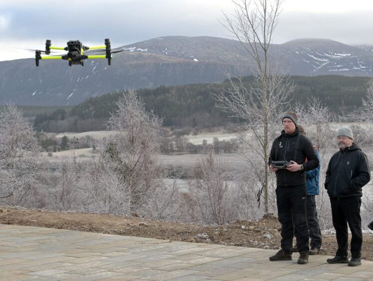 Man controlling drone.