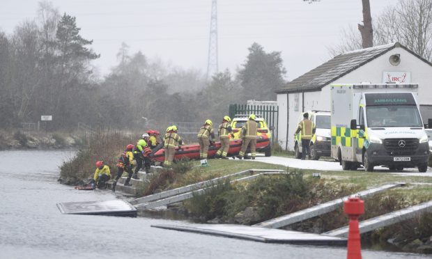 Emergency crews at the scene near Torvean Swing Bridge. Image: Sandy McCook/ DC Thomson.