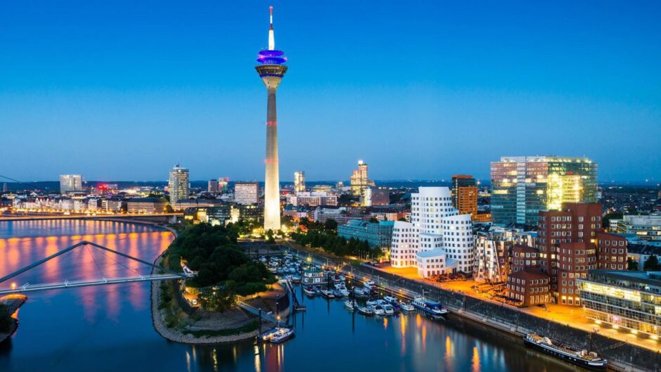 The Dusseldorf cityscape at night.