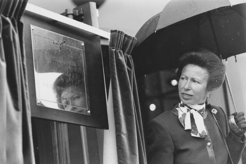 The Princess Royal unveils a plaque at the official opening of SMG's Peregrine House headquarters in 1993.