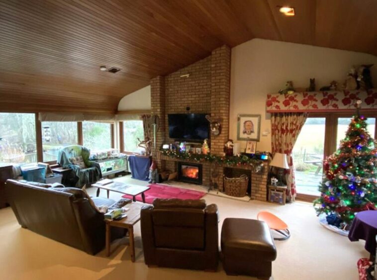 The cottage has a spacious living room area. 