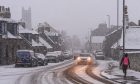 Snowy conditions made for tricky driving throughout the northeast and Highlands. Image: Darrell Benns/DC Thomson