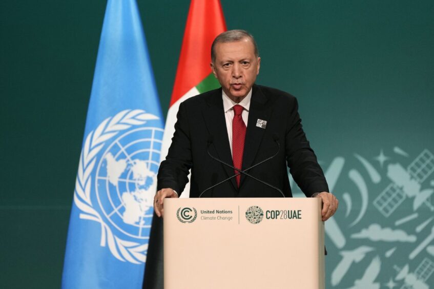 Turkey President Recep Tayyip Erdogan speaks during a plenary session at the COP28 U.N. Climate Summit, Friday, Dec. 1, 2023, in Dubai, United Arab Emirates.