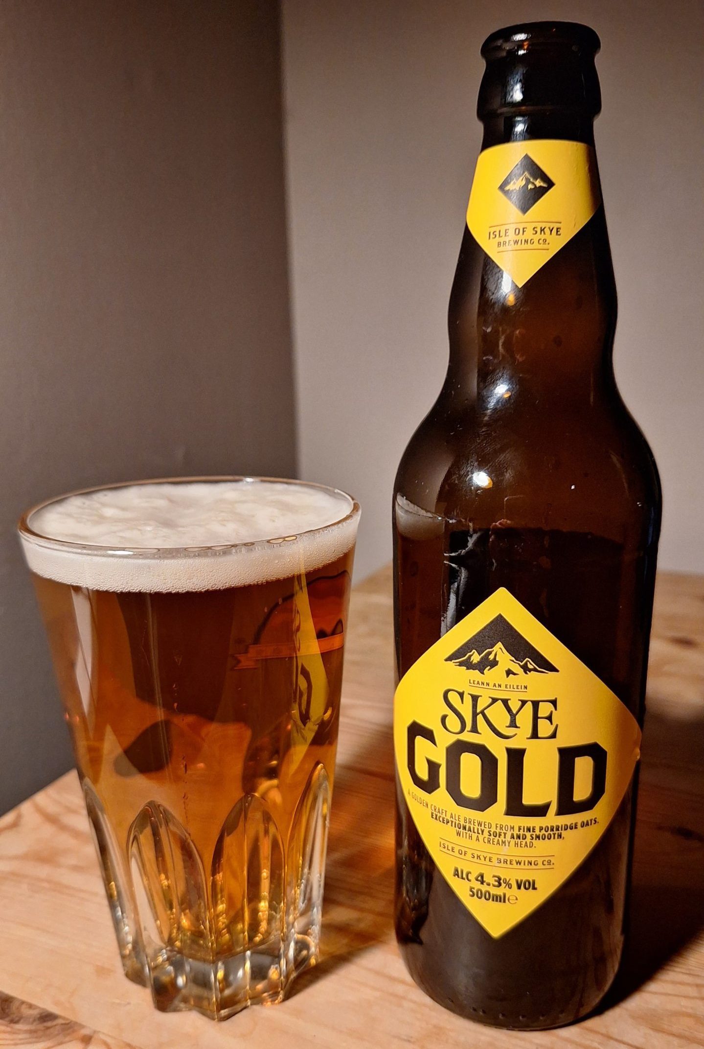 A bottle of Isle of Skye Brewing Company's Skye Gold, poured into a glass. 