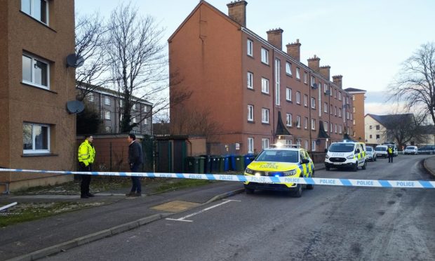 A heavy police presence remains at the scene at Gilbert Street near the River Ness