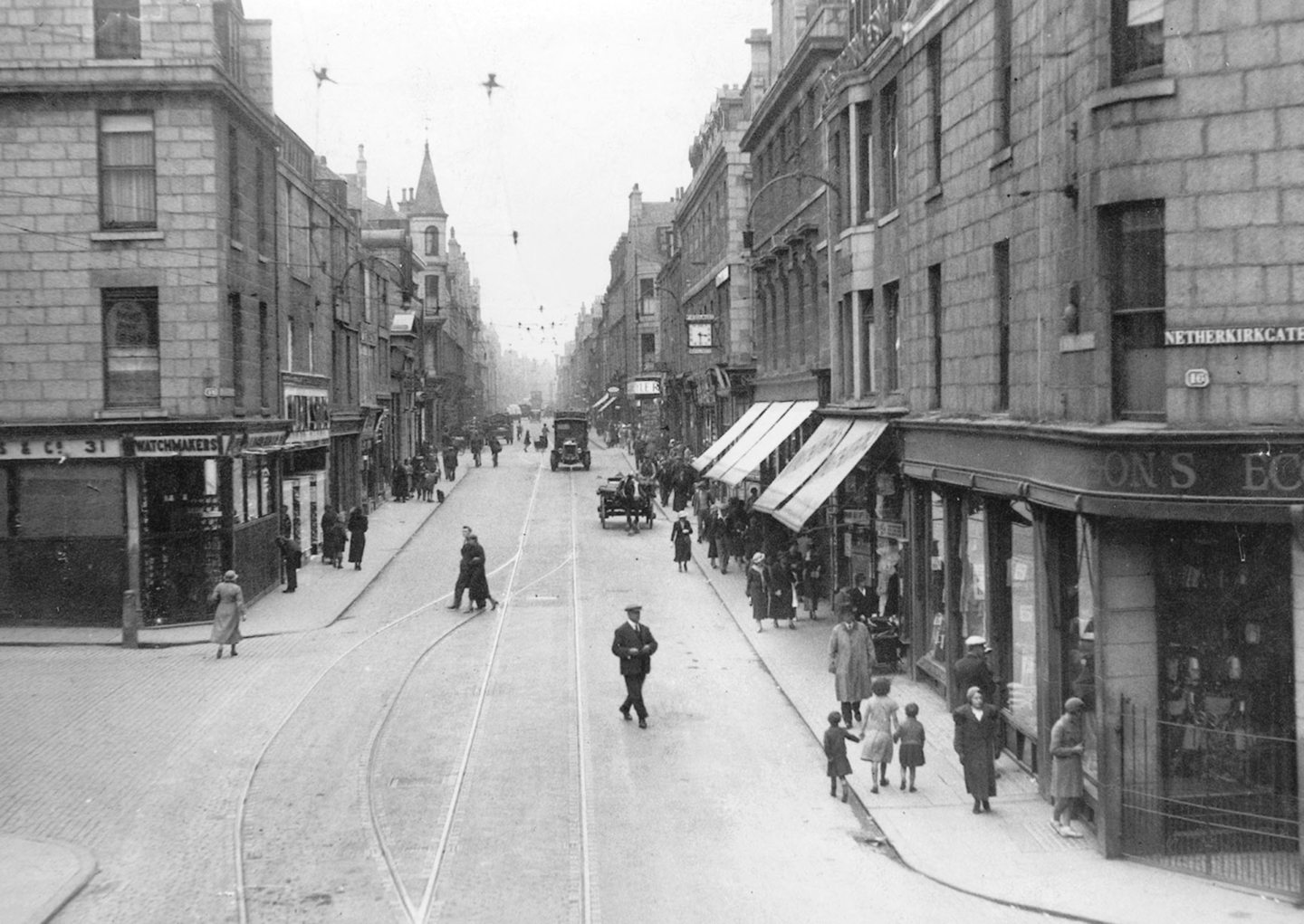 Tram lines and horse-drawn carts on Aberdeen's St Nicholas Street in this atmospheric picture, believed to be from the 1930s, with Morrison's store on the corner of Netherkirkgate which is now the site of Marks and Spencer