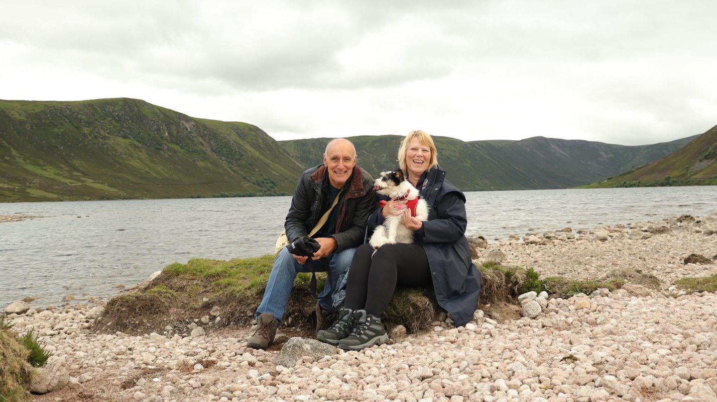 Caroline Lowe, one of the participants on Sky show Landscape Artist of the Year, with her dog in Scotland.