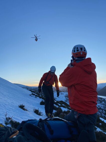 Rescue helicopter headed to airlift hiker who fell down icy slope on Balmoral Estate near Loch Muick.