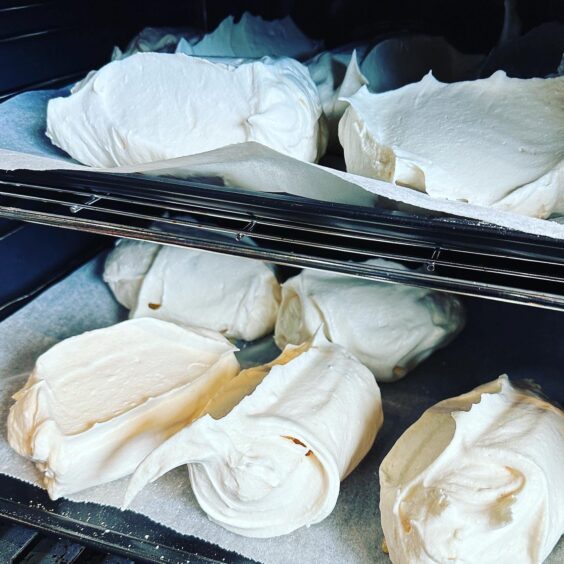 Large, freshly-baked meringues. 