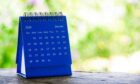 Blue calendar on table
