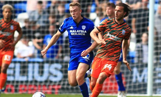 Eli King, left, of Cardiff City, competes for the ball with Birmingham City' Ivan Sunjic. Image: Shutterstock