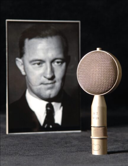 William Joyce, also known as Lord Haw Haw, and the microphone he used for his broadcasts.