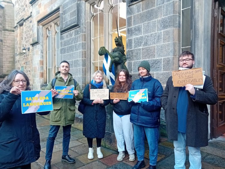 Students protested outside King's College in late November as the changes were announced