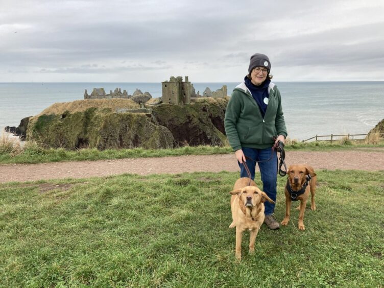 Marion Montgomery with her two dogs near Stonehaven.