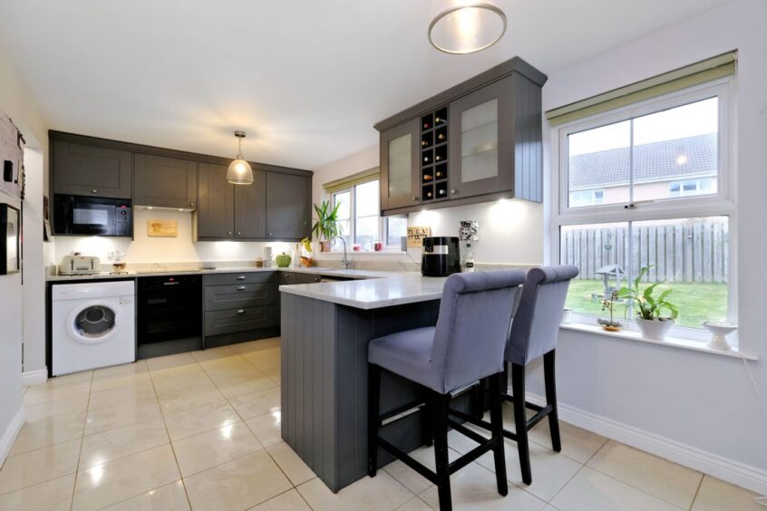 Sleek and stylish kitchen within the Inverurie property.