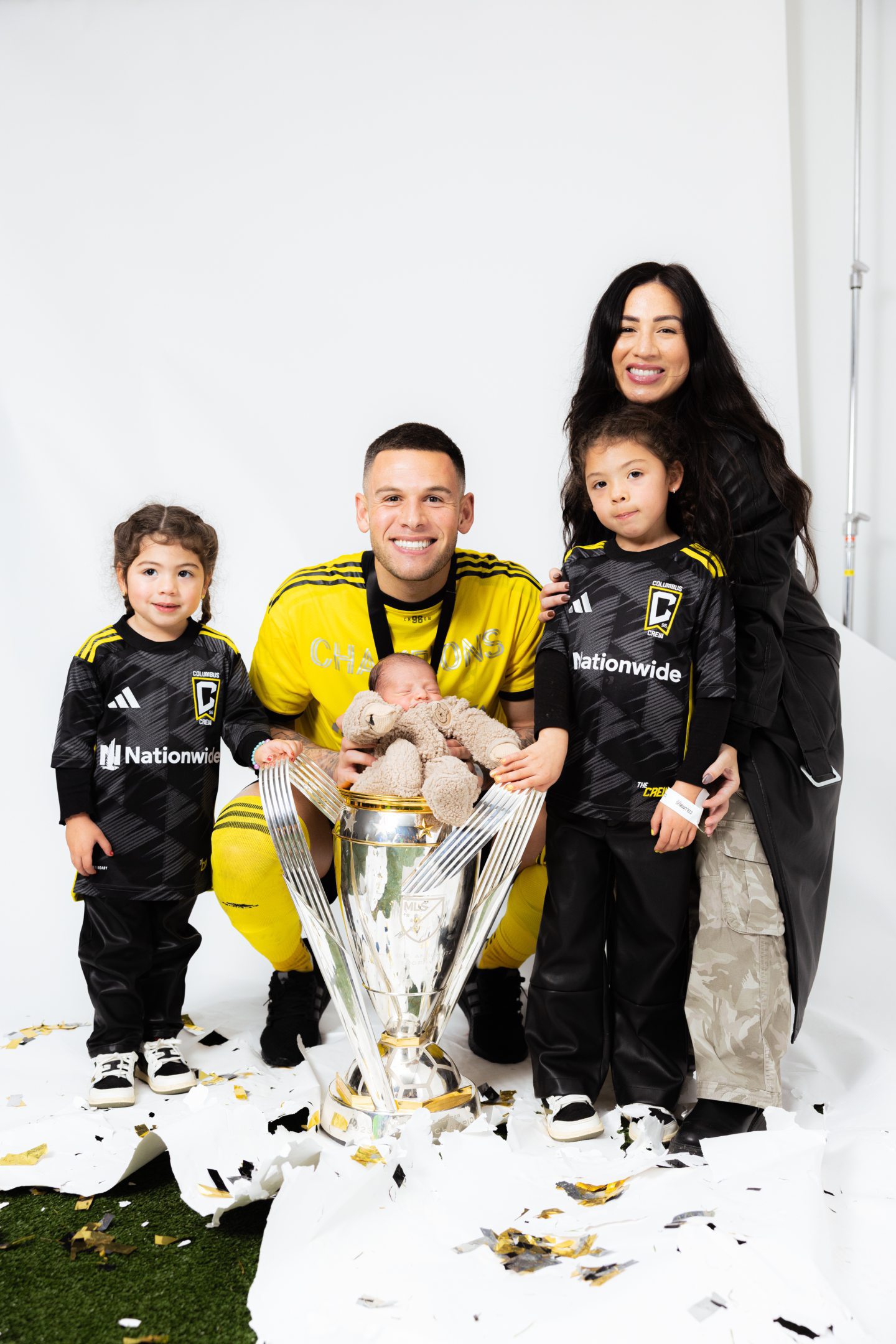 Christian Ramirez and his family with the MLS Cup trophy. Left to right Zara, Christian, Nova, wife Valerie - with son Kash in the trophy. Image supplied by Columbus Crew 