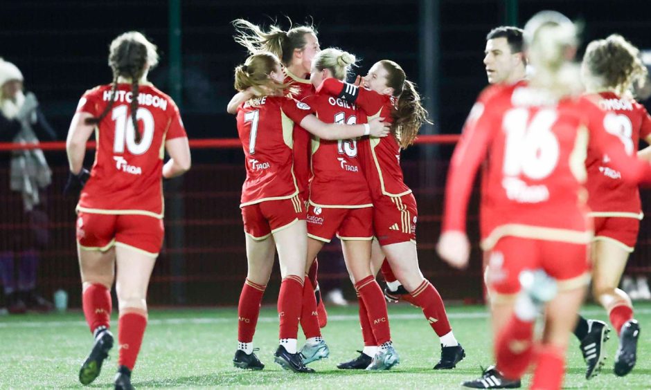 Aberdeen Women celebrate after Francesca Ogilvie's winner against Montrose in a SWPL fixture.