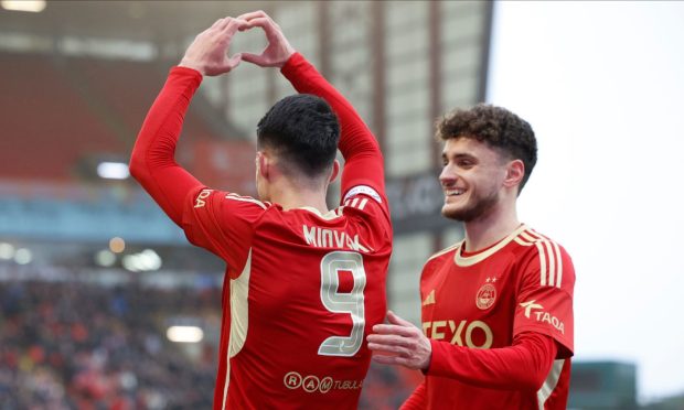 Aberdeen striker Bojan Miovski celebrates scoring the opener against Bonnyigg Rose with Dante Polvara. Image: Shutterstock