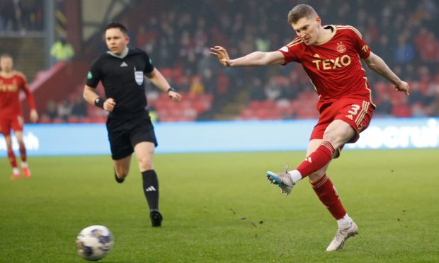 Jack MacKenzie of Aberdeen shoots at goal against Bonnyrigg Rose. Image: Shutterstock.