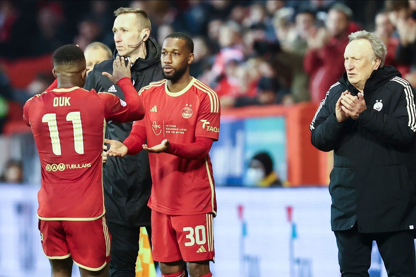 Junior Hoilett (30) of Aberdeen is substituted on for Duk for his debut. Image: Shutterstock