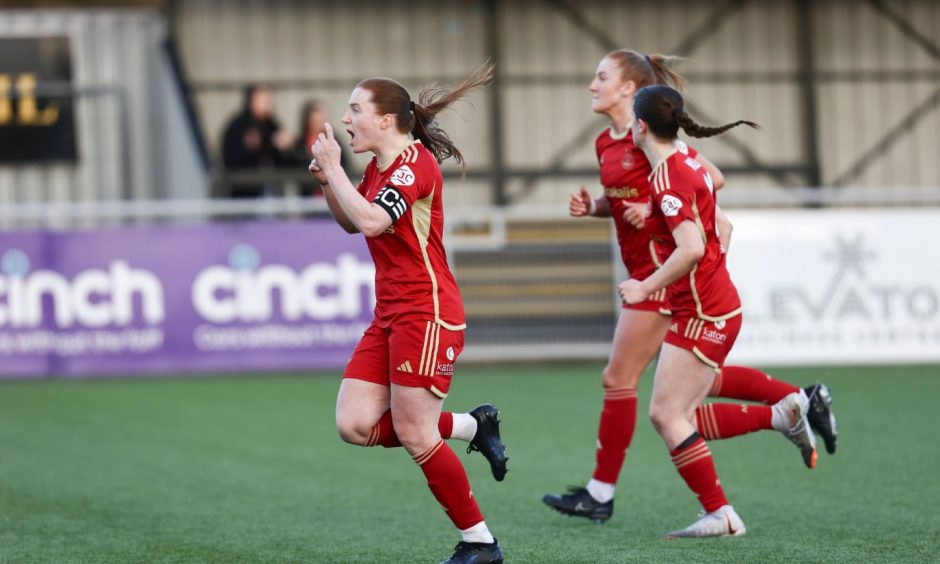 Aberdeen Women captain Hannah Stewart pleads concentration to her team-mates after pulling the Dons level in the SWPL fixture against Dundee United.