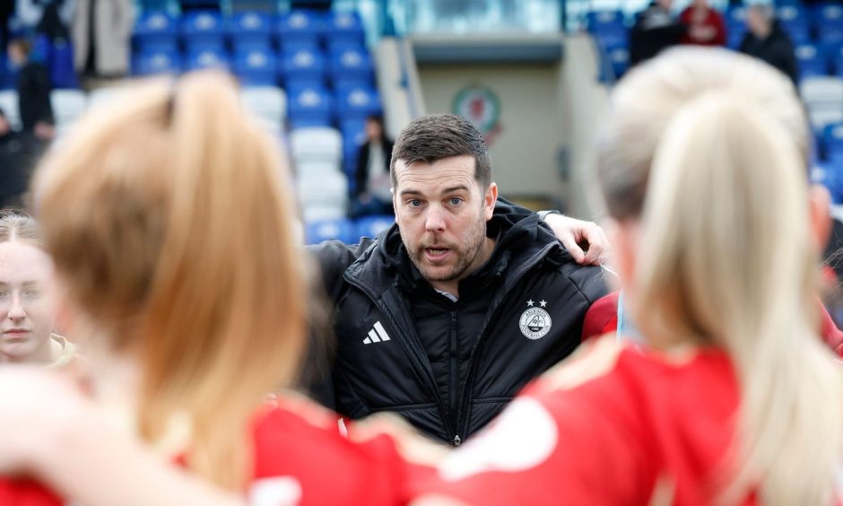 Aberdeen Women manager Clint Lancaster deliver a post-match team talk after a win against Dundee United in the SWPL
