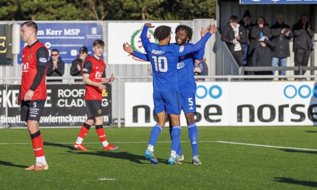 Cove's Rumarn Burrell celebrates his goal in the win against Annan. Image: Dave Cowe.