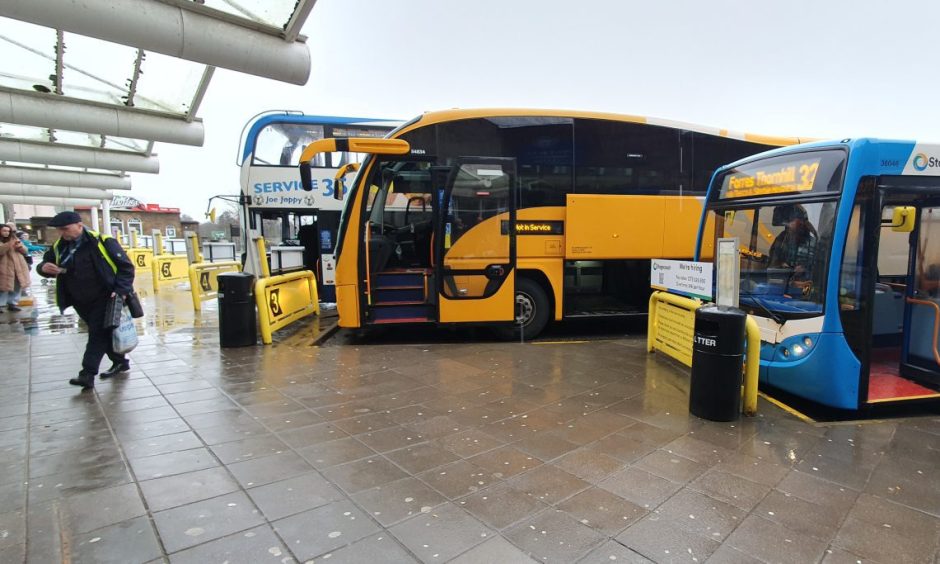 Buses parked at Elgin bus station.