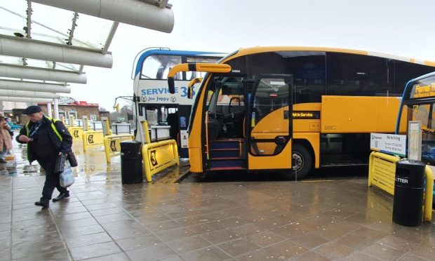 Buses parked at Elgin bus station.