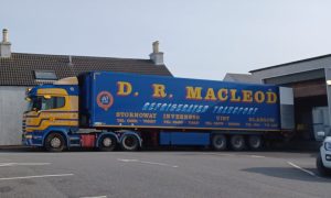 A delivery fan with D. R. MacLeod branding.