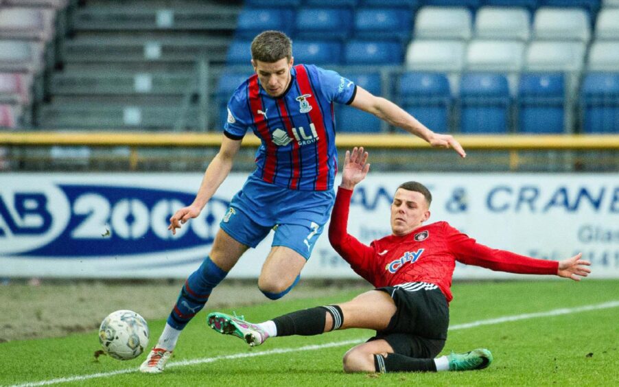 Charlie Gilmour and Queen's Park's Josh Scott in action earlier this year