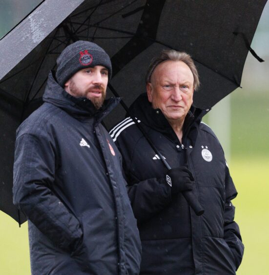 Aberdeen manager Neil Warnock alongside head of analysis Marc Rochon. Image: SNS.