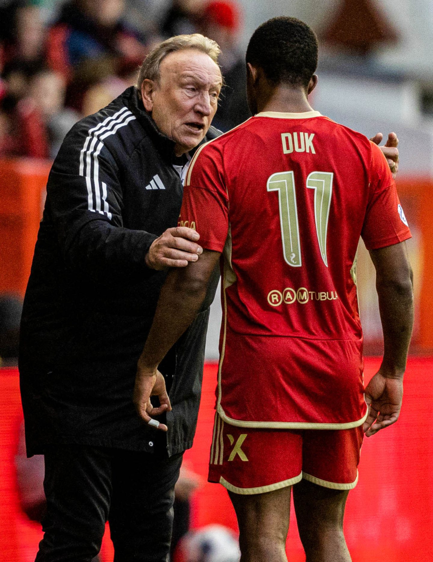 Aberdeen interim manager Neil Warnock with Duk during the Scottish Cup defeat of Bonnyrigg Rose. Image: SNS 