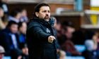 Cove Rangers manager Paul Hartley shouts instructions from the touchline.