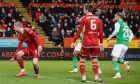 Hibernian's Emiliano Marcondes scores to make it 2-2 against Aberdeen at Pittodrie.