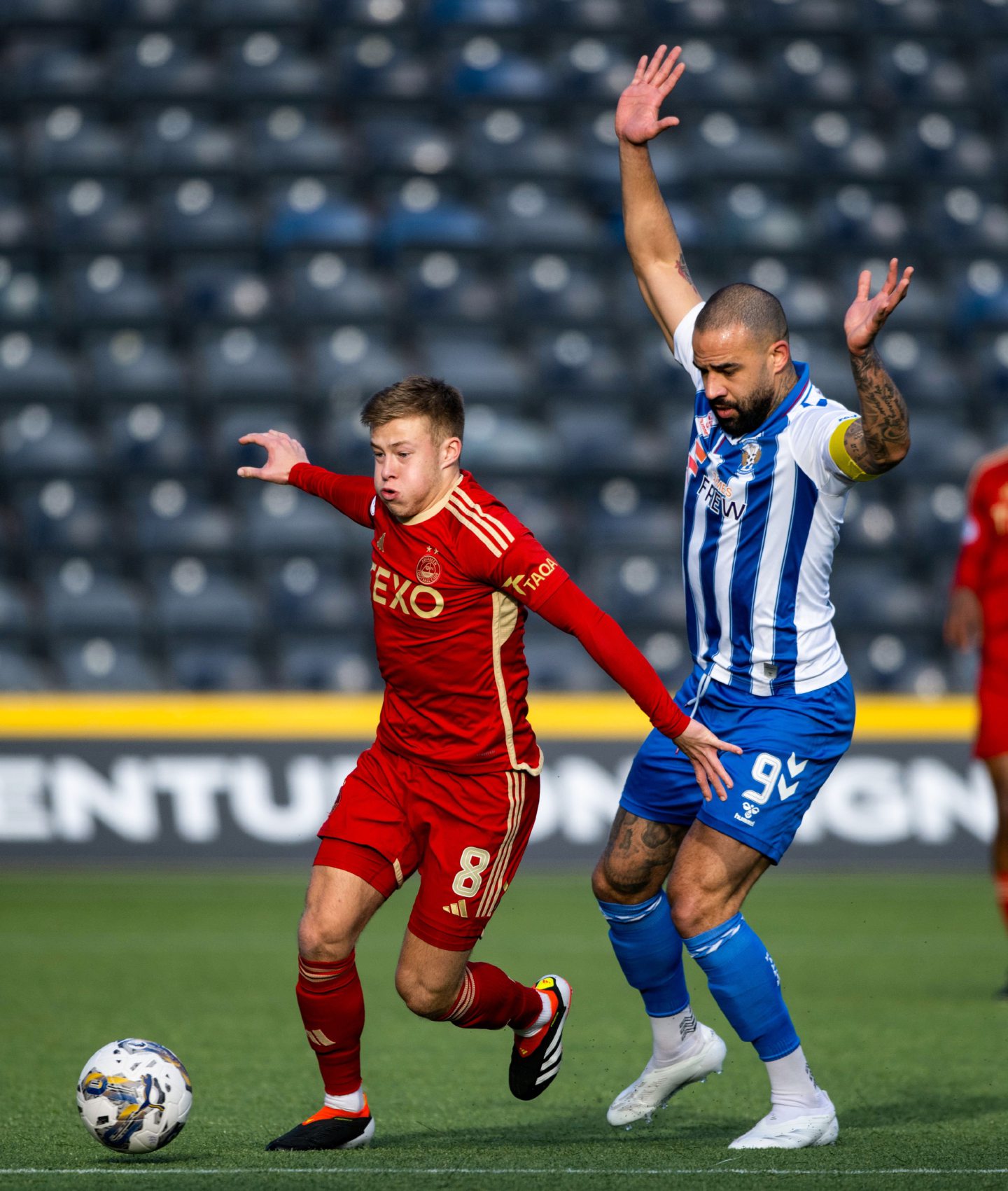 Kilmarnock's Kyle Vassell and Aberdeen's Connor Barron in action in a Premiership clash. Image: SNS 