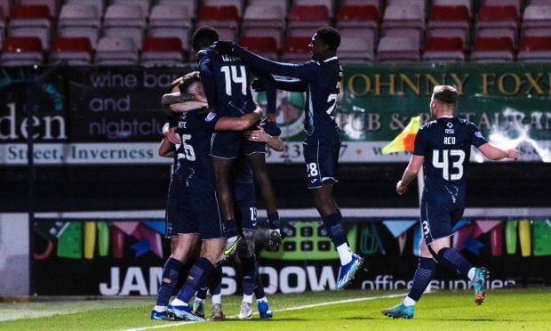 Ross County celebrate Jordan White's goal against St Mirren. Image: SNS