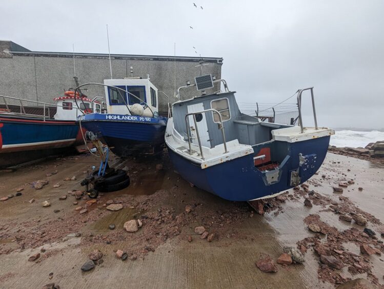 Boddam harbour has been partially destroyed in a storm.