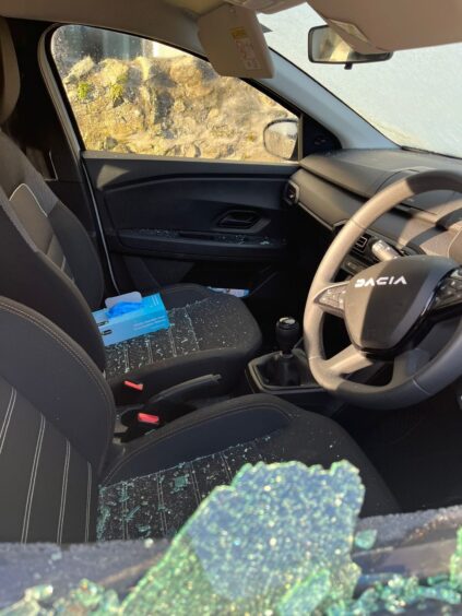 Car windows have been smashed by vandals. 