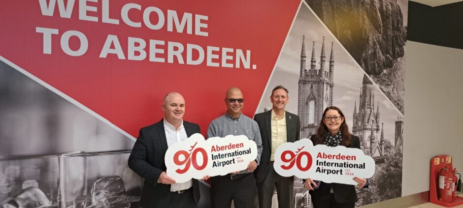 Aberdeen Airport staff getting ready for the 90th anniversary celebrations. 