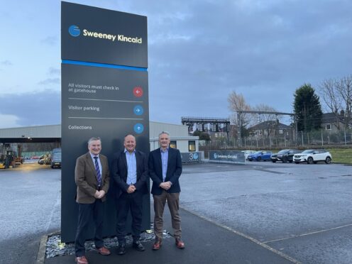 DEAL DONE: From left, ANM Group's chairman Mike Macaulay, managing director of Sweeney Kincaid Russell Kincaid, and ANM Group chief executive Grant Rogerson.