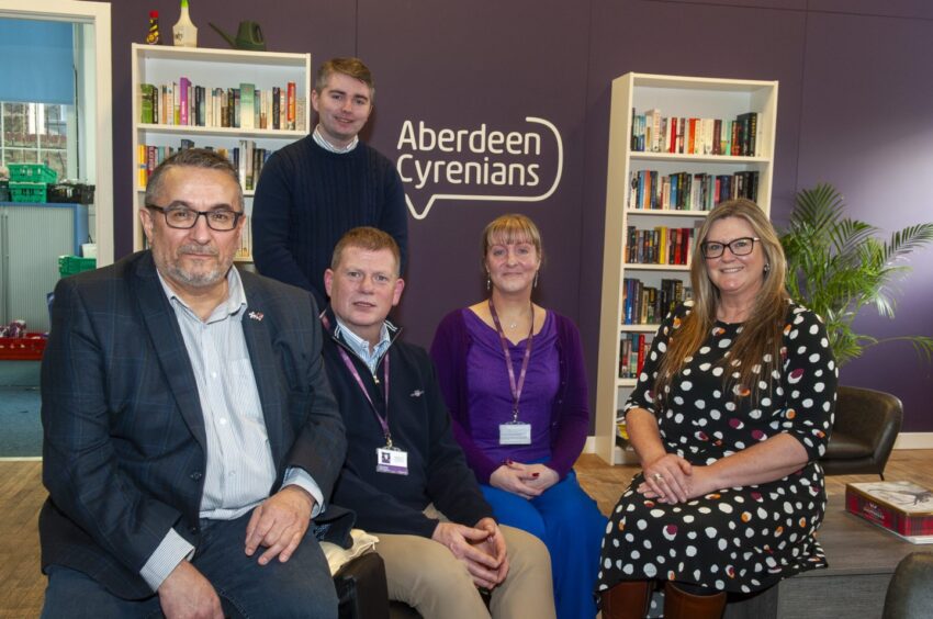 Councillors Christian Allard and Desmond Bouse with Donna Hutchison, head of corporate and business services, Sandy Anderson, finance manager, and Jen McAughtrie, head of services at the Aberdeen Cyrenians